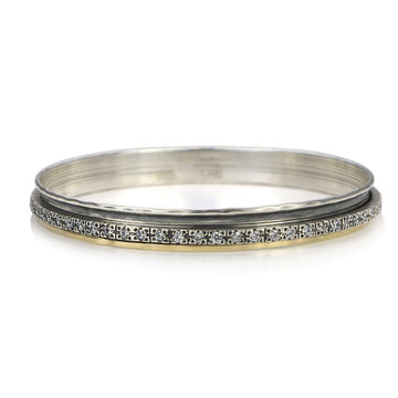 Stunning bangles that have spinning bands that help relieve stress & anxiety.